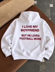 I Love My Boyfriend But He Loves Football More Oversized Hoodie – White